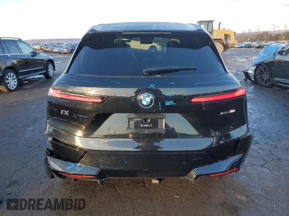 2025 BMW iX xDrive50 with VIN WB523CF0XSCT63136, listed as a Copart auction lot 44538265 with 230 mi miles and Salvage Title. Bid and sale history available at carsss.com. Image 6.