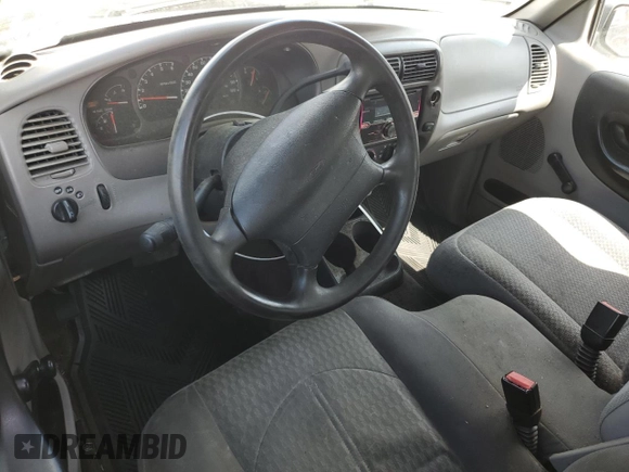 2002 Mazda B-Series Truck DS z VIN 4F4YR16U72TM03068, wystawiony jako Copart lot #55536395 z przebiegiem 199 895 mil mil oraz Czysty tytuł • Clean title. Historia ofert i sprzedaży dostępna na DreamBid. Obrazek 8.