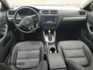 2013 Volkswagen Jetta SE z VIN 3VWDP7AJXDM296643, wystawiony jako Copart lot #60992095 z przebiegiem 159 637 mil mil oraz Szkoda całkowita • Salvage title. Historia ofert i sprzedaży dostępna na DreamBid. Obrazek 8.