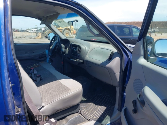 1998 Ford F-150 with VIN 1FTZX1728WKA58760, listed as a IAAI auction lot 42832277 with 189,085 mi miles and . Bid and sale history available at DreamBid. Image 5.