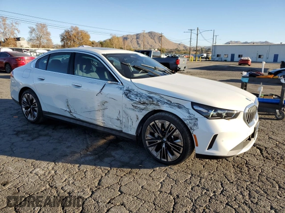 2024 BMW 5 Series 530i with VIN WBA43FJ0XRCS05943, listed as a Copart auction lot 87277084 with 4,924 mi miles and Salvage Title. Bid and sale history available at carsss.com. Image 4.