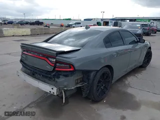 2018 Dodge Charger Daytona with VIN 2C3CDXCT5JH122550, listed as a IAAI auction lot 41131961 with 111,293 mi miles. Bid and sale history available at carsss.com. Image 4.