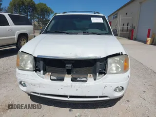 2007 GMC Envoy SLE with VIN 1GKDT13S472223365, listed as a IAAI auction lot 41690531 with 170,539 mi miles. Bid and sale history available at carsss.com. Image 6.