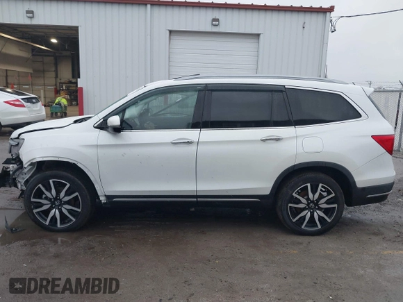 2021 Honda Pilot Touring 8-Passenger z VIN 5FNYF6H90MB031795, wystawiony jako IAAI lot #41207263 z przebiegiem 56 367 mil mil oraz . Historia ofert i sprzedaży dostępna na DreamBid. Obrazek 15.