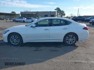 2016 Infiniti Q70 with VIN JN1EY1APXGM470039, listed as a IAAI auction lot 41331470 with 62,831 mi miles and . Bid and sale history available at DreamBid. Image 14.
