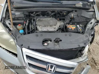 2007 Honda Odyssey EX-L z VIN 5FNRL38657B011922, wystawiony jako Copart lot #56147975 z przebiegiem 149 451 mil mil oraz Szkoda całkowita • Salvage title. Historia ofert i sprzedaży dostępna na DreamBid. Obrazek 12.