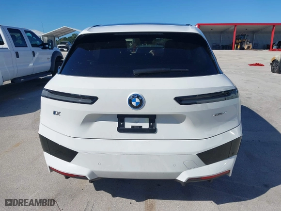 2025 BMW iX xDrive50 with VIN WB523CF02SCT10334, listed as a IAAI auction lot 40396663 with 971 mi miles. Bid and sale history available at carsss.com. Image 17.