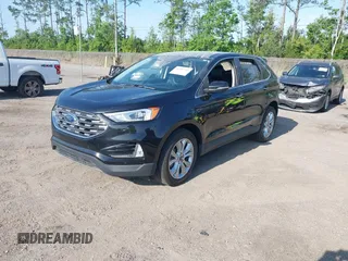 2022 Ford Edge Titanium with VIN 2FMPK4K99NBA45354, listed as a IAAI auction lot 42187761 with 75,458 mi miles and . Bid and sale history available at DreamBid. Image 17.