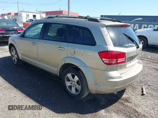 2009 Dodge Journey SXT with VIN 3D4GG57V69T232517, listed as a IAAI auction lot 42039587 with 346,783 mi miles. Bid and sale history available at carsss.com. Image 3.