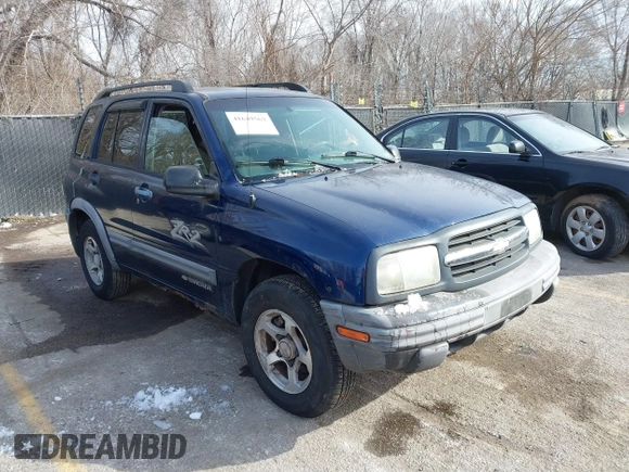 2004 Chevrolet Tracker ZR2 z VIN 2CNBJ734746917149, wystawiony jako IAAI lot #41649562 z przebiegiem 216 092 mil mil oraz . Historia ofert i sprzedaży dostępna na DreamBid. Obrazek 1.
