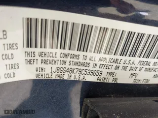 2009 Jeep Grand Cherokee Laredo with VIN 1J8GS48K79C539659, listed as a IAAI auction lot 42063431 with 1 mi miles. Bid and sale history available at carsss.com. Image 9.