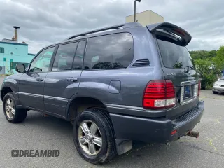 2007 Lexus LX 470 z VIN JTJHT00W674021577, wystawiony jako Copart lot #59510665 z przebiegiem 270 615 mil mil oraz Czysty tytuł • Clean title. Historia ofert i sprzedaży dostępna na DreamBid. Obrazek 3.