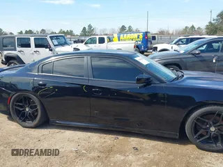 2019 Dodge Charger R/T with VIN 2C3CDXCT2KH575297, listed as a IAAI auction lot 41661339 with 119,854 mi miles and . Bid and sale history available at DreamBid. Image 13.