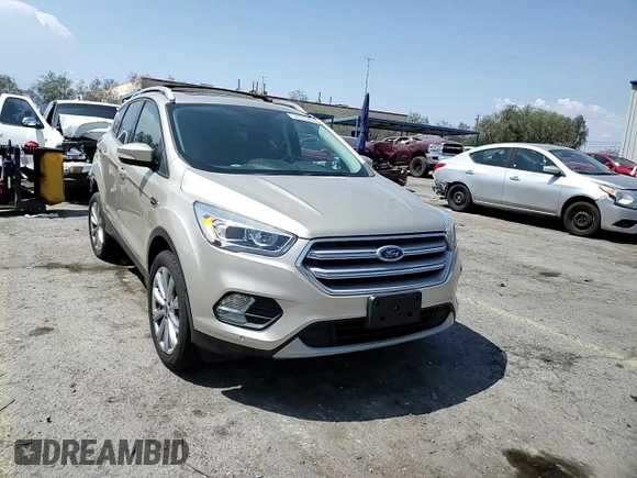 2018 Ford Escape Titanium with VIN 1FMCU9J91JUB44813, listed as a Copart auction lot 59920265 with 63,008 mi miles and Salvage title. Bid and sale history available at DreamBid. Image 14.