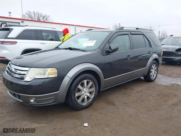 2008 Ford Taurus X SEL with VIN 1FMDK05WX8GA23924, listed as a IAAI auction lot 42019262 with 146,185 mi miles. Bid and sale history available at carsss.com. Image 17.