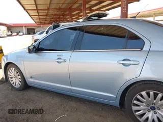 2010 Ford Fusion Hybrid with VIN 3FADP0L32AR143350, listed as a IAAI auction lot 42549839 with 137,466 mi miles and . Bid and sale history available at DreamBid. Image 14.