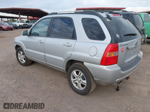 2005 Kia Sportage LX with VIN KNDJE723557070596, listed as a IAAI auction lot 42008414 with 215,204 mi miles and . Bid and sale history available at carsss.com. Image 3.