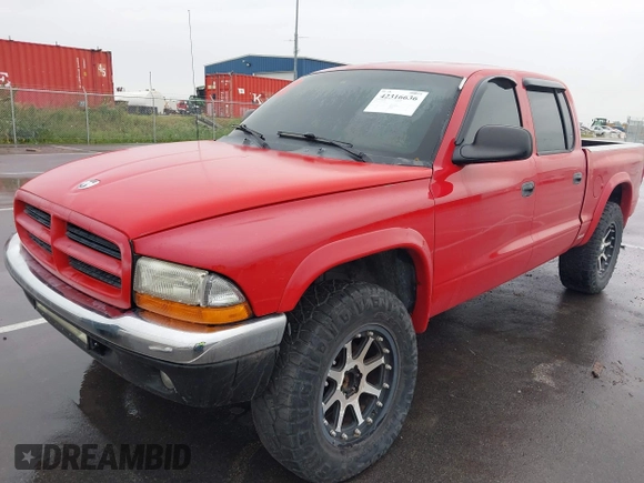 2001 Dodge Dakota Sport z VIN 1B7GG2AN91S110843, wystawiony jako IAAI lot #42316636 z przebiegiem 263 073 mil mil oraz . Historia ofert i sprzedaży dostępna na DreamBid. Obrazek 2.