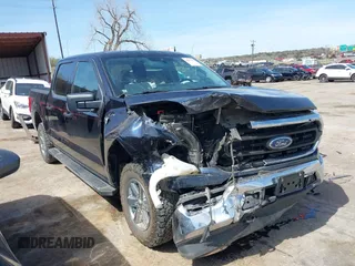 2021 Ford F-150 XL z VIN 1FTFW1E86MFB31305, wystawiony jako IAAI lot #41877501 z przebiegiem 140 285 mil mil oraz . Historia ofert i sprzedaży dostępna na DreamBid. Obrazek 14.