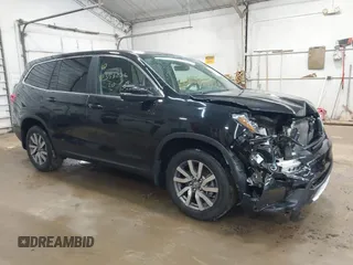2020 Honda Pilot EX-L z VIN 5FNYF6H58LB061994, wystawiony jako IAAI lot #42358236 z przebiegiem 49 436 mil mil oraz . Historia ofert i sprzedaży dostępna na DreamBid. Obrazek 1.