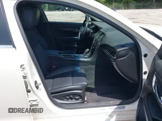 2014 Cadillac ATS Standard RWD with VIN 1G6AA5RA6E0171128, listed as a IAAI auction lot 42226859 with 90,308 mi miles and . Bid and sale history available at DreamBid. Image 5.