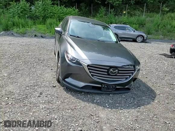 2019 Mazda CX-9 Touring z VIN JM3TCBCY5K0328655, wystawiony jako Copart lot #64627255 z przebiegiem 54 658 mil mil oraz Szkoda całkowita • Salvage title. Historia ofert i sprzedaży dostępna na DreamBid. Obrazek 14.
