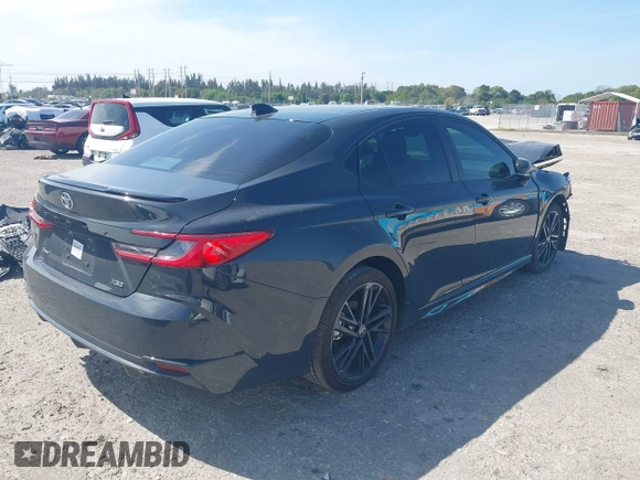 2025 Toyota Camry LE with VIN 4T1DAACK5SU076886, listed as a IAAI auction lot 41629641 with 9,919 mi miles and . Bid and sale history available at DreamBid. Image 4.