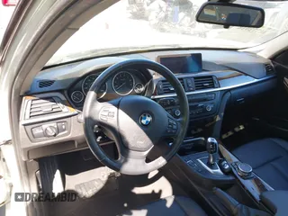 2015 BMW 3 Series 320i with VIN WBA3B1G56FNT06434, listed as a IAAI auction lot 41772918 with 76,782 mi miles. Bid and sale history available at carsss.com. Image 21.