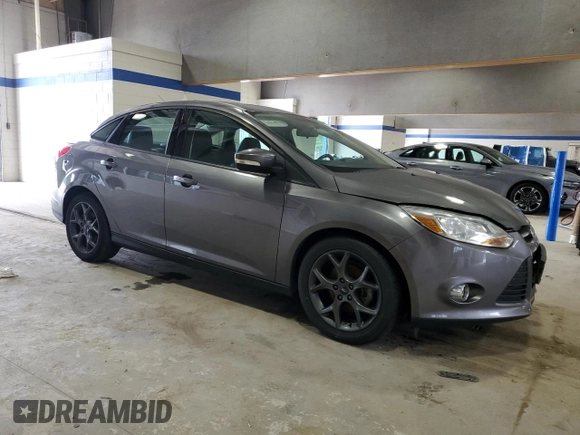 2013 Ford Focus SE with VIN 1FADP3F20DL250081, listed as a Copart auction lot 62140995 with 78,118 mi miles and Salvage title. Bid and sale history available at DreamBid. Image 4.