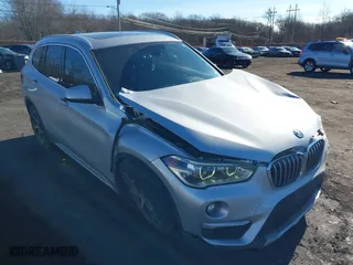 2018 BMW X1 xDrive28i with VIN WBXHT3C36J5L33781, listed as a IAAI auction lot 41497360 with 61,251 mi miles. Bid and sale history available at carsss.com. Image 17.