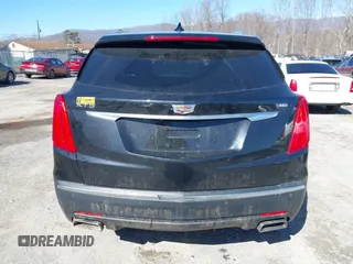 2018 Cadillac XT5 FWD with VIN 1GYKNARS5JZ235585, listed as a IAAI auction lot 41607440 with 77,220 mi miles and . Bid and sale history available at DreamBid. Image 16.