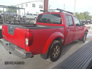 2005 Nissan Frontier SE with VIN 1N6AD07U95C463775, listed as a IAAI auction lot 42783610 with 196,085 mi miles and . Bid and sale history available at DreamBid. Image 4.