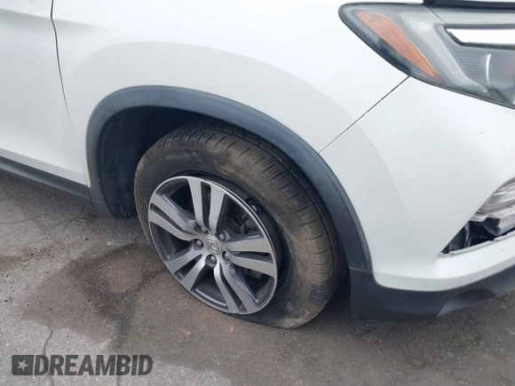 2016 Honda Pilot EX-L with VIN 5FNYF5H55GB015166, listed as a IAAI auction lot 42003009 with 142,488 mi miles and . Bid and sale history available at DreamBid. Image 6.