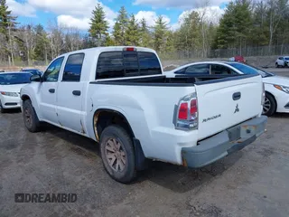 2008 Mitsubishi Raider LS with VIN 1Z7HT28K68S610064, listed as a IAAI auction lot 41908361 with 93,356 mi miles. Bid and sale history available at carsss.com. Image 3.