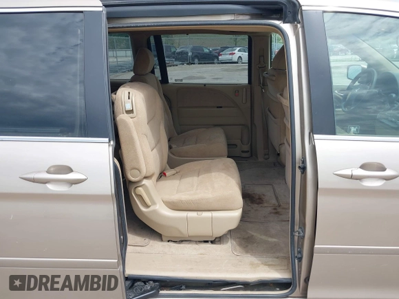 2005 Honda Odyssey EX with VIN 5FNRL38475B029026, listed as a IAAI auction lot 42489079 with 156,075 mi miles and . Bid and sale history available at DreamBid. Image 8.