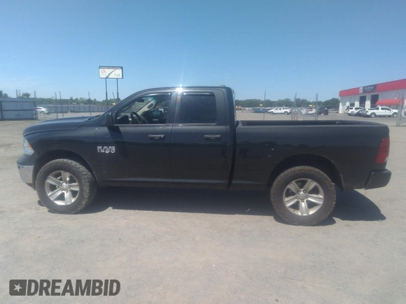 2015 Ram 1500 Tradesman with VIN 1C6RR7FG2FS784213, listed as a IAAI auction lot 42310905 with 110,805 mi miles and . Bid and sale history available at DreamBid. Image 14.