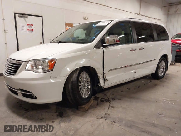 2016 Chrysler Town & Country Touring-L with VIN 2C4RC1CG3GR284527, listed as a IAAI auction lot 41898213 with 198,148 mi miles. Bid and sale history available at carsss.com. Image 22.
