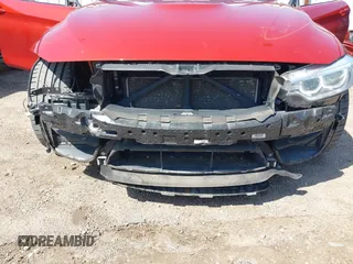 2015 BMW M4 with VIN WBS3R9C5XFK333441, listed as a IAAI auction lot 41774716 with 76,224 mi miles. Bid and sale history available at carsss.com. Image 6.