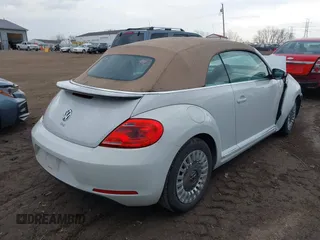 2015 Volkswagen Beetle 1.8T w/Tech with VIN 3VW517AT3FM805868, listed as a IAAI auction lot 40886820 with 113,380 mi miles and . Bid and sale history available at DreamBid. Image 4.
