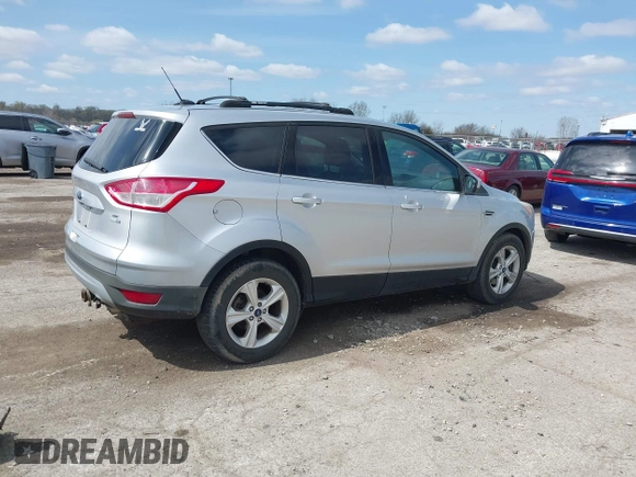2014 Ford Escape SE z VIN 1FMCU9G93EUC02045, wystawiony jako IAAI lot #41923565 z przebiegiem 202 011 mil mil oraz . Historia ofert i sprzedaży dostępna na DreamBid. Obrazek 4.