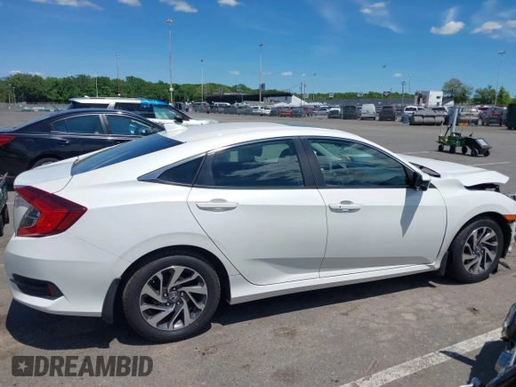 2017 Honda Civic EX z VIN 19XFC2F71HE061331, wystawiony jako IAAI lot #42319287 z przebiegiem 200 730 mil mil oraz . Historia ofert i sprzedaży dostępna na DreamBid. Obrazek 13.