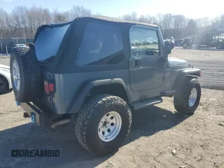 2002 Jeep Wrangler Sport with VIN 1J4FA49S22P703610, listed as a Copart auction lot 50900605 with 70,045 mi miles and Salvage Title. Bid and sale history available at carsss.com. Image 3.