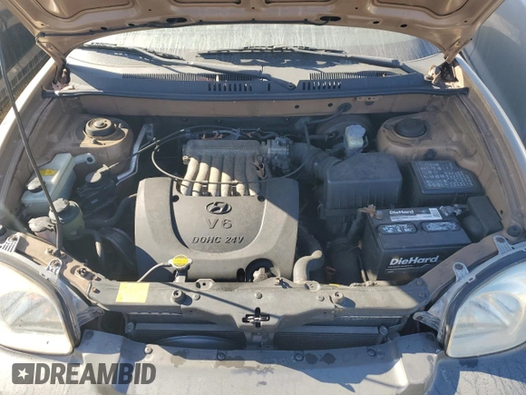 2001 Hyundai Santa Fe GLS with VIN KM8SC83D71U084837, listed as a Copart auction lot 77588984 with 102,585 mi miles and Salvage Title. Bid and sale history available at carsss.com. Image 12.