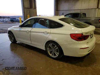 2018 BMW 3 Series 330i xDrive with VIN WBA8Z9C5XJG828289, listed as a Copart auction lot 42535195 with 57,623 mi miles and Salvage Title. Bid and sale history available at carsss.com. Image 2.