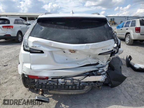2020 Cadillac XT4 FWD Sport с VIN 1GYFZER45LF028178, выставлен на аукционе Copart как лот 49118175 с пробегом 52 345 миль миль и Списание • Salvage title. История ставок и продаж доступна на DreamBid. Изображение 6.