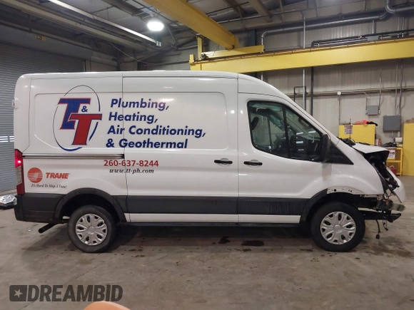 2021 Ford Transit Cargo with VIN 1FTBR1C82MKA29712, listed as a IAAI auction lot 41463781 with 83,961 mi miles and . Bid and sale history available at DreamBid. Image 14.