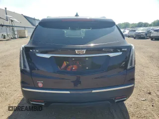 2021 Cadillac XT5 AWD Sport with VIN 1GYKNGRS8MZ152739, listed as a Copart auction lot 60675705 with 51,669 mi miles and Salvage title. Bid and sale history available at DreamBid. Image 6.