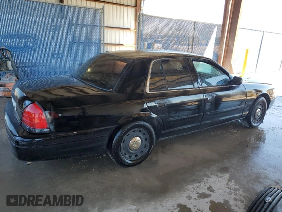 2003 Ford Police Interceptor Street Appear with VIN 2FAHP71W63X181563, listed as a Copart auction lot 43734574 with 195,534 mi miles and Salvage title. Bid and sale history available at DreamBid. Image 3.