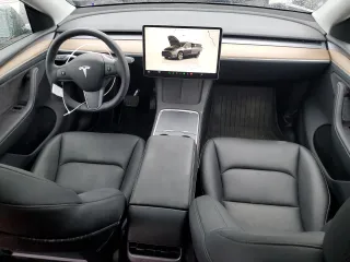 2023 Tesla Model Y Long Range with VIN 7SAYGDEE3PA151887, listed as a Copart auction lot 51459495 with 15,562 mi miles and Salvage Title. Bid and sale history available at DreamBid. Image 8.