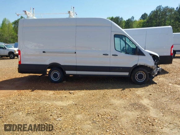 2021 Ford Transit Cargo z VIN 1FTBW3X88MKA42155, wystawiony jako IAAI lot #41988889 z przebiegiem 74 643 mil mil oraz . Historia ofert i sprzedaży dostępna na DreamBid. Obrazek 14.
